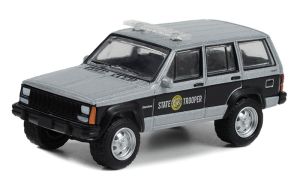 Voiture sous blister de la série HOT PURSUIT - JEEP Cherokee 1995 Patrouilleur de l'État de Caroline du Nord