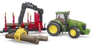 Tracteur avec remorque forestière et rondins John deere 7930