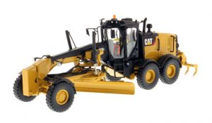 CATERPILLAR 12M3 avec ripper accompagné d'une figurine et d'une boite en métal
