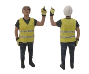 ADF32145 - Figurine de chantier avec gilet jaune et son casque levant le doigt