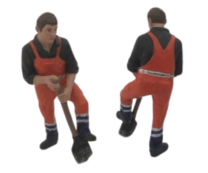 ADF32146 - Figurine de chantier avec cotte orange et sa pelle