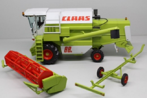 REP168 - Moissonneuse batteuse CLAAS Dominator 88s et chariot porte coupe