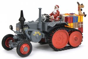 Tracteur sur chenilles LANZ BULLDOG avec le Père Noël et des cadeaux