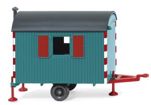 Caravane de chantier de couleur rouge et bleu