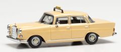 HER095693 - Véhicule de couleur Ivoire TAXI – MERCEDES 200 fintail