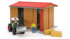 BRU62620 - Hangar avec tracteur FENDT 209S équipé du chargeur à godet et personnage jouet BRUDER