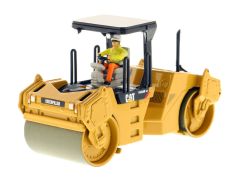 DCM85132 - CATERPILLAR CB534D XW avec canopy accompagné d'une figurine