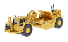 DCM85134 - CATERPILLAR 627G bi-moteur accompagné d'une figurine et d'une boite en métal