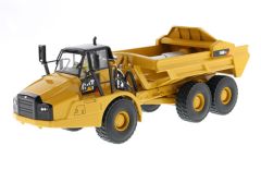 DCM85500 - CATERPILLAR 740B articulé vérin éjecteur accompagné d'une figurine et d'une boite en métal