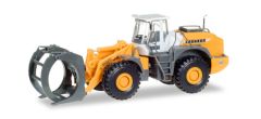 LIEBHERR L580 sur pneus chargeur avec pince à grume