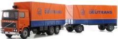 HER071321 - Camion 6x2 porteur VOLVO F 10 baché et remorque 2 essieux aux couleurs du transporteur Deutrans