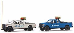 2 voitures 4x4 FORD F250 version pick-up aux couleurs de l'entreprise SARENS