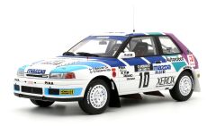 OT1099 - Voiture des 1000 Lakes rally 1991 pilotée par Tommi MAKINEN - MAZDA 323 GTX GR.A #10