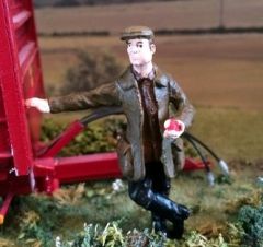 WM062B - Figurine Mangeant une pomme