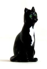 WMA4 - Chat assis en miniature de couleur noir