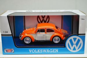 Voiture de couleur orange et beige – VW Beetle avec porte bagage