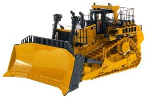 DCM85565 - CATERPILLAR D11T équipé du ripper accompagné d'une figurine et d'une boite en métal