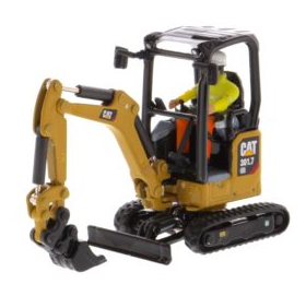CATERPILLAR 301.7 CR mini pelle sur chenilles accompagnée d'une figurine et d'une boite en métal