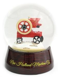 NH2329C - Coffret NEW HOLLAND avec une boule à neige en verre