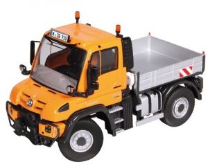 Camion porteur plateau MERCEDES Unimog U400 de couleur orange