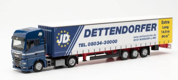 semi-remorque bâché blanche à 4 essieux (la bâche couvrant les portes